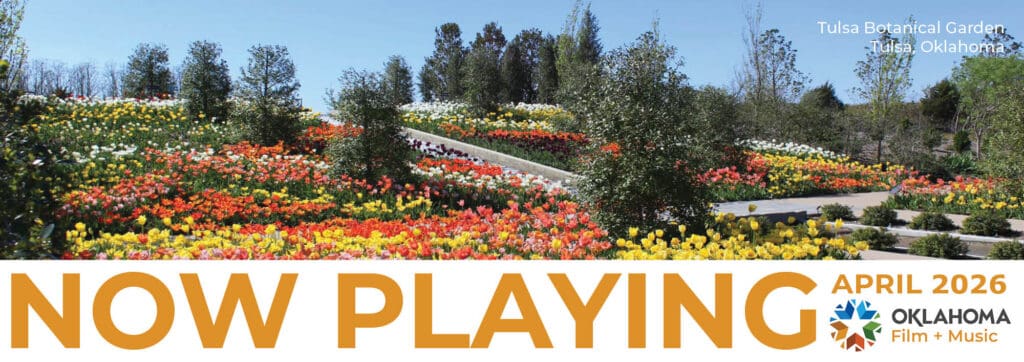Now Playing April 2026 newsletter header with photo of tulips at Tulsa Botanical Garden